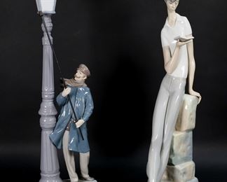       125	Two Lladro Porcelain Figurines	Lladro boy student, 17 1/4" H; Lladro lamplighter 5205, 18 1/4" H.

