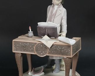        136	Lladro Porcelain Figure Young Beethoven	Lladro porcelain figure 1815, Young Beethoven. With blue Lladro mark and artist signed Juan Coderch and Julio Ruiz on the underside. Number 769 from the limited edition of 2500, with certificate. 8 7/8"H x 7 1/4"L.

