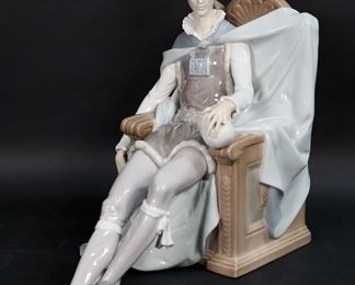        138	Lladro Porcelain Figure Hamlet & Yorick	Lladro porcelain figure 1254, Hamlet & Yorick. Blue Lladro mark to the underside. 12"H x 14 3/4"L. Finger chipped and missing on one hand.

