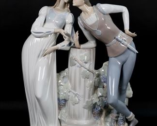        139	Lladro Porcelain Figure Group Romeo & Juliet	Lladro porcelain figure group 4750, Romeo & Juliet. Blue Lladro mark to the underside. 17 1/2"H x 12 1/2"W. Romeo missing flower in right hand.

