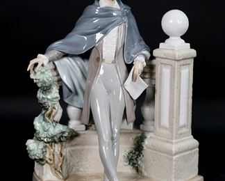        150	Lladro Porcelain Figure The Poet	Lladro porcelain figure 5397, The Poet. Blue Lladro mark to the underside. 11 5/8"H x 9 3/8"W.
