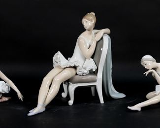        154	3 Lladro Porcelain Ballerina Figurines	3 Lladro porcelain ballet dancer figurines. Swan Ballet 5920, 5 3/4"H; Death of the Swan 4855, 5 3/8"H; Classic Dance 4847, 9 3/4"H. All with blue Lladro marks. Flakes to underside of Death of the Swan.
