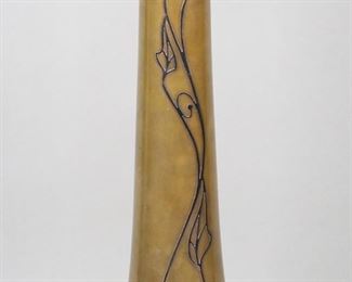        174	Heintz Sterling on Bronze Arts & Crafts Vase	Heintz Art Metal bronze vase, sterling silver overlay, arts and crafts design. Impressed H AMS mark and 3625A to the underside. 17 1/2"H. Dents to rim, neck and base, and small dents throughout; tarnish to sterling and tarnish and losses to patina on bronze, horizontal line of discoloration to neck and discoloration / remnants of a label on the underside.
