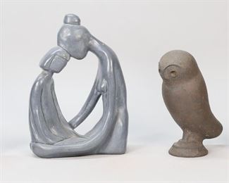        175	Modern Decorative Grouping	4 modern decorative items. Art pottery owl sculpture, signed illegibly along base, 8 1/2"H; Klara Sever for Austin Productions patinated plaster sculpture Mother & Child, signed Sever and marked Austin Prod. Inc. 1971, 11"H x 7 1/4"L; pair of Danish modern style wooden bookends, each 7 1/4"H x 4 1/4"W. Scratches to bottom corner of 1 bookend.
