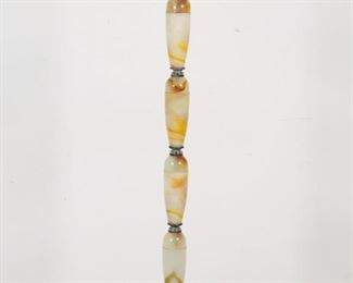        187	Mid Century Modern Murano Style Glass Floor Lamp	"Mid Century Modern Murano style glass floor lamp. 20th century. Floor lamp on metal base supporting colorful glass post topped with white linen shade. Tears and tattering to linen of shade. Tarnishing and wear throughout metal of base. Air bubbles, scuffs, and fleabites to glass throughout lamp. 

69"" H x 18"" diameter of shade. 19 lbs."
