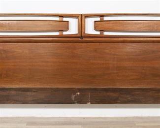        202	Kent Coffey Style Mid Century Modern Headboard	"Mid Century Modern headboard in the style of Kent Coffey. 20th century. Walnut king size headboard with brackets for bed frame. No maker's marks or labels present. Wear, light scuffs, and marks throughout wood of headboard.

81 5/8"" W x 2"" D x 36"" H. 32 lbs."
