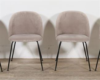        206	Four Eames Style Side Chairs by Rove Concepts	"Four side chairs in the style of Charles Eames (St. Louis, MO, 1907-1978) and Ray Eames (Sacramento, CA, 1912-1988). Produced by Rove Concepts. 21st century. Gray velvet seats on four black cylindrical legs. Rove Concepts label on underside of chairs. Small circular indentation and spot stains on seat of one chair. 

19 5/8"" W x 22 1/2"" D x 29"" H. 17 1/2"" seat height. Each chair weighs 16 lbs."
