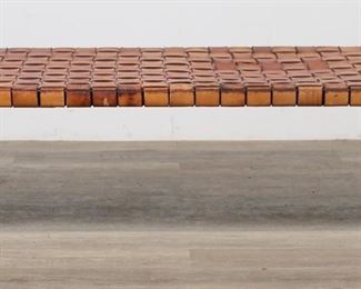        208	Erwine and Estelle Laverne Mid Century Bench	"Erwine Laverne (Austrian, 1909-2003) and Estelle Laverne (New York, 1915-1997) for Laverne Originals. Mid 20th century. Woven leather and chrome legs. Unmarked, no maker's marks or labels present. Wear and staining to chrome of legs. Wear, staining, losses, scratches and scuffs to leather throughout bench. Tears and separations to woven leather on one section of bench. 

75"" W x 26 5/8"" D x 14 1/8"" H. 57 lbs."
