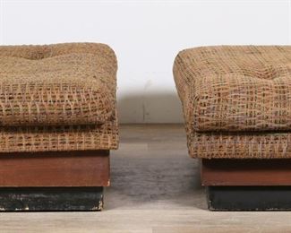        217	Pair of Mid Century Modern Ottomans	"Pair of Mid Century Modern ottomans. 20th century. Black painted and veneered pressboard platform bases with upholstered tops and cushions. One ottoman is set on casters and is topped with vinyl underside cushion, the other topped with plywood and linen.  As is, with chips, losses and wear throughout pressboard of bases of both ottomans. Wear and pilling to upholstery. Tears and staining to linen support on top of one ottoman. 

30 1/2"" W x 30 3/8"" D x 14 1/2"" H. Lot weighs 111 lbs. total."

