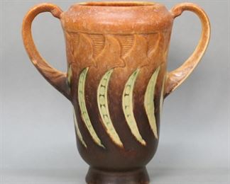        259	Roseville Falline Pottery Vase	Roseville 2 handled pottery vase, in the Falline pattern. Roseville Pottery paper label to the underside. 6 1/4"H.
