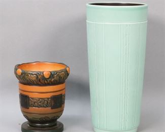        268	2 Danish Pottery Vases Peter Ipsen & Aluminia	2 Danish pottery vases. Peter Ipsen vase, impressed PE Denmark marks and 595 on the underside, 4 7/8"H x 4"-diameter at top; Aluminia vase, green mark to the underside, 9 3/8"H. Discoloration and scratches to interior of Ipsen vase.
