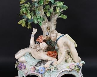        288	Vienna Porcelain Figure Group Prometheus	Vienna porcelain figure group, Heracles and Prometheus. With bocage tree and applied flowers and leaves. Blue Vienna shield "beehive" mark to the underside. 17"H x 13"W. Minor losses to painted decoration, chips and losses to squirrel and applied flowers and leaves and leaves in tree, repairs and restorations to flowers, leaves and tree throughout,

