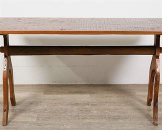        306	Primitive Baroque Style Trestle Table	"Primitive Baroque style trestle table. Live wood top, mortis and tenon joinery. Wear, scratches, and split to wood of top. Scratches, marks and gouges to wood of legs. Splitting and crack to wood on leg of one side of table. 

59 7/8"" W x 24"" D x 30 3/4"" H.

From the collection of a prominent Connecticut family.
"
