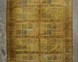        322	Persian Style Tree of Life Pictorial Rug	"Persian style tree of life pictorial rug. Floral and tree of life motifs against yellow field. Tag on underside of one corner. Wear and warping throughout rug. Losses and fading to dye and threads of sections of rug. Staining and wear to fringe. 

13' 11 1/8"" x 9' 7 1/8""."
