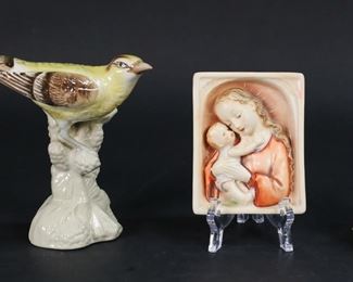        378	3 Pieces Porcelain Hummel, Royal Dux, Copenhagen	3 piece porcelain lot. Royal Copenhagen figurine Faun sitting on a stump, 3 1/2"H; Royal Dux bird figurine, 6 1/4"H; Hummel Madonna plaque with incised crown mark, 4 1/8" x 3 1/4".
