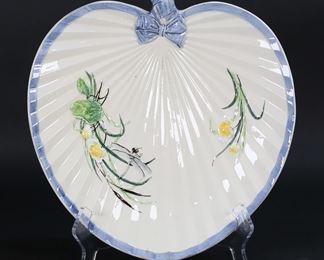        382	Majolica Dragonfly Platter	Majolica clamshell platter with dragonfly and flower motif. 12 3/8" x 12". Crazing, minor chips on rim and to bow.
