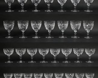        384	31 Pieces Webb Corbett Crystal Stemware	31 pieces Webb Corbett English crystal stemware. 14 water goblets, each 5 3/8"H; 17 champagne / sherbets, each 4 1/2"H. Chips to rims of 2 water goblets and 1 sherbet.
