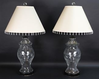        386	Pair of Glass Apothecary Jar Lamps	Pair of glass apothecary jar form lamps. Each 31 1/2"H including harp and finial. Losses to paint decoration on bases of both.
