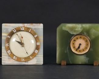        412	Lot of Four Polished Stone Clocks	Lot of four polished stone clocks. Includes a green onyx Waltham clock, a green onyx Plymouth clock, a General Electric alabaster, and a Telechron alabaster. The Waltham clock measures 6 1/2" W x 2 3/4" D x 6 3/4". The Waltham clock is separating from its base and has chip above the separation. There is a scratch to the face of the Plymouth clock and the Telechron clock has some chipping along the edges as well as moderate corrosion on the numbered periphery. All clocks have some metal corrosion. The working condition of all clocks are unknown.
