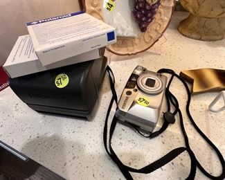 Polaroid camera and film( old) and camera