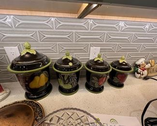 4 kitchen canisters with fruit motif 