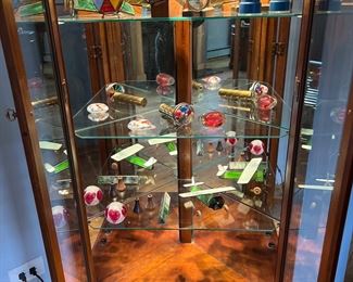 Corner Curio Cabinet filled with Kaleidoscopes 