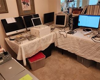 Room full of mostly Apple Computers