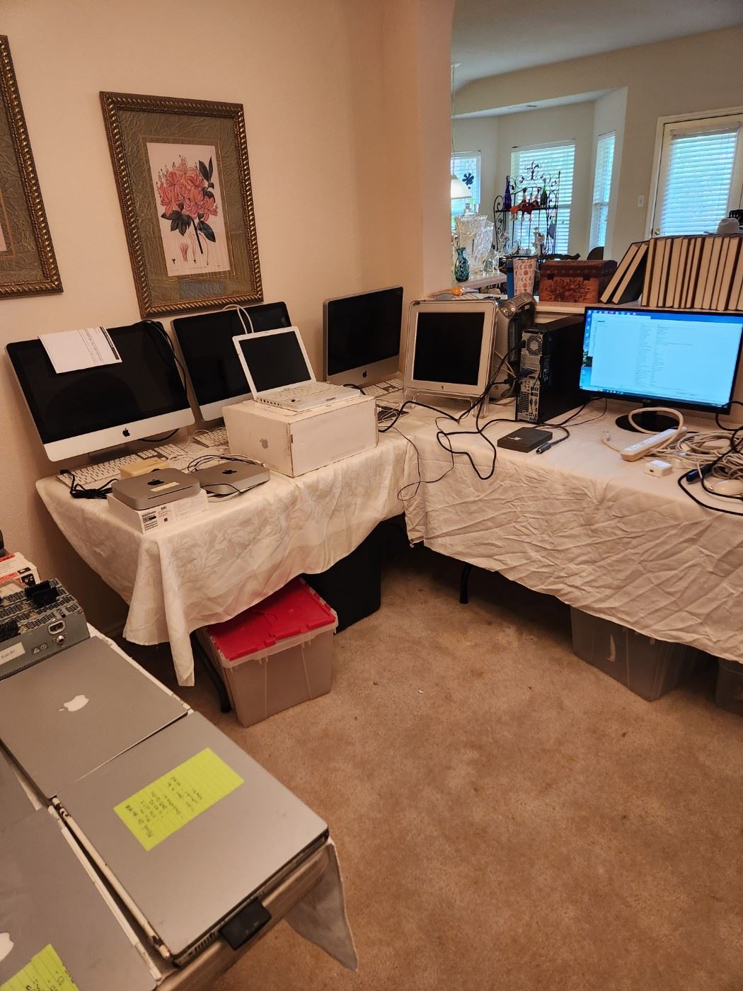 Room full of mostly Apple Computers