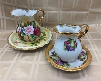 LOT 005- Pair of decorative bowl and pitchers one is 5.5 in and the other is 6.5 in. tall  was $35***SALE $20