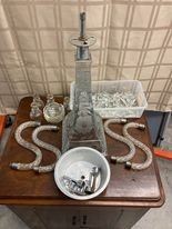 LOT#35- Cut glass candelabra 20 in tall with some minor chips and one missing candle holder $225