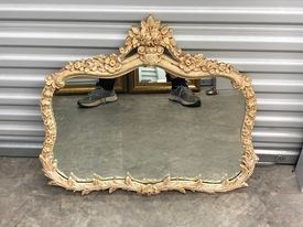 LOT#43- Damaged off white wood mirror 28in by 28in $25