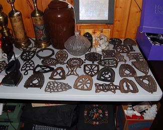 These are all old trivets, I have more that are 1950s