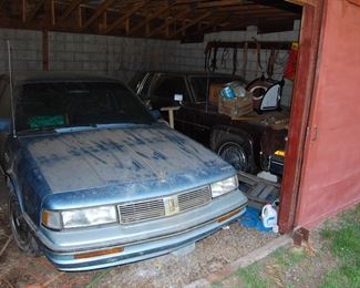 Old barn find cars--Oldsmobile and a Cadillac , need love