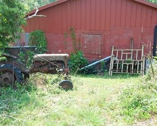 Cub Cadet Tractor and disc...yard Art, old brass bed