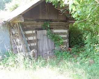 Original log cabin. full of treasures and 3 lawn mowers...go digging and I will price it