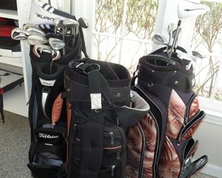 Golf bags and clubs