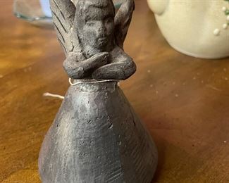 Antique black clay bell