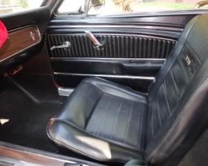 CLOSE UP VIEW OF ORIGINAL PONY INTERIOR AND STEERING WHEEL ON VINTAGE 1966 MUSTANG IN EXCELLENT CONDITION AND STARTS SECOND PHASE ON JUNE 22 THRU JUNE 25, 2023. 