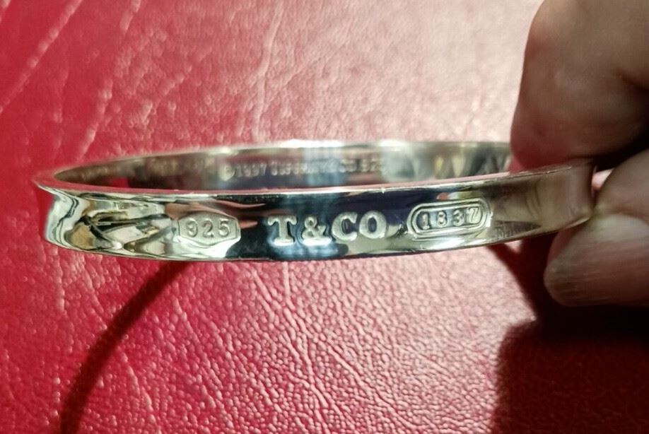 KM3000 VINTAGE TIFFANY COMPANY STERLING SILVER BRACELET https://www.ebay.com/str/agesagoestatesales