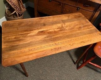 Larkin Soap Company table with printed yardstick on top
