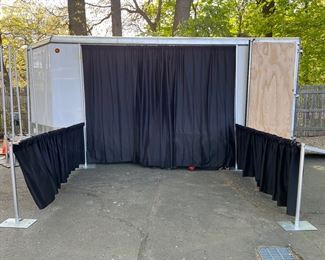 Exhibitors pipe & drape backdrop with three sides. Back drape is 8-ft tall and can be 6-ft to 10-ft wide. Side drapes are 36-inches tall and can be 6-ft to 10-ft wide.