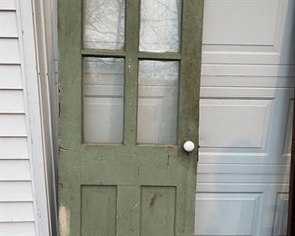 Antique 30-inch wood door with arched windows.