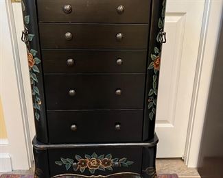 Jewelry storage case with floral stencils