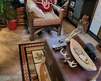 Twig chair antlers rug trunk