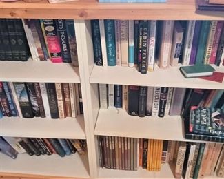 Two of the three sections of books in the loft