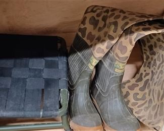 Waders and a hunting stand seat