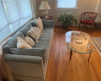 Mid-Century Modern couch, glass coffee table, upholstered chair