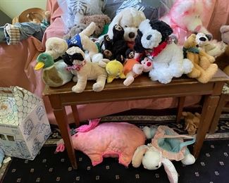 Coffee table and stuffed animals 