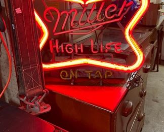 Vintage neon sign.  Only the outside part lights up.