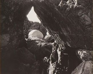 82
Imogen Cunningham
1883-1976
"Rock At Big Sur," 1964
Gelatin silver print on paper laid to mat board, as issued
From the edition of unknown size
Signed and dated in pencil on the mat board, directly below the image: Imogen Cunningham; dated again and titled on the artist's studio label affixed to the verso of the mat board; the Strathmore brand mat board with the manufacturer's blindstamp in the lower left corner
Image/Sheet: 11.25" H x 10.75" W; Original mat board support: 20" H x 15" W
Estimate: $1,000 - $2,000